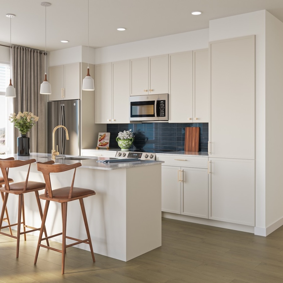 a kitchen with white cabinets