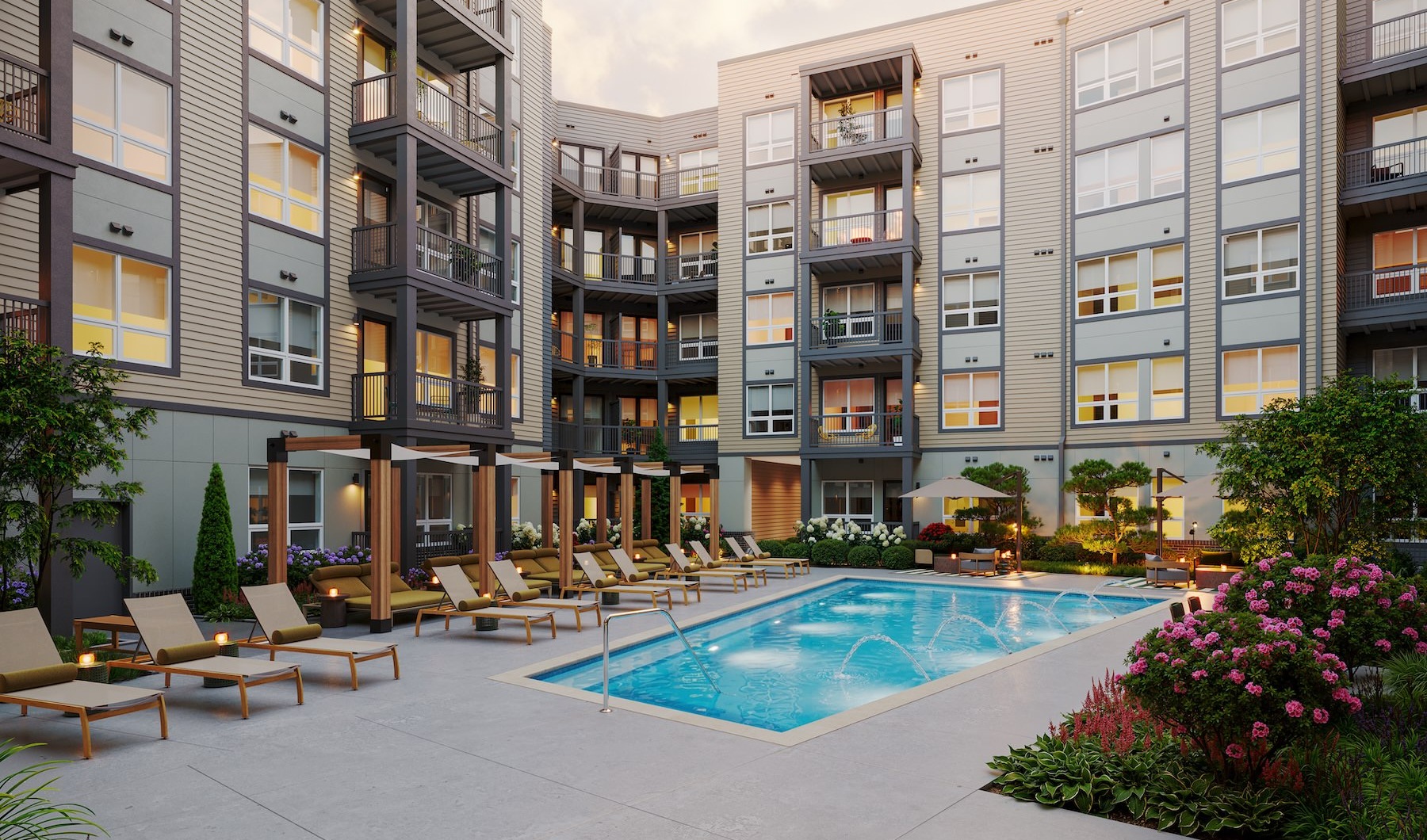 a courtyard with a pool and chairs